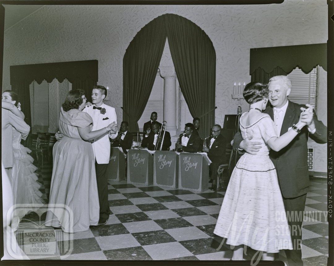 Black and white photograph of Nat Story band performing at Ballard County Memorial High School Prom at the Irvin Cobb Hotel, circa 1955. The photograph appears per the McCracken County Public Library Digital Collections. To find out more visit www.digitalcollections.mclib.net .